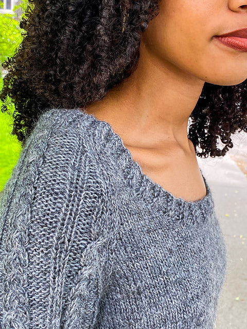 132B Woman’s Cabled Sleeve Raglan (Plymouth Yarn)